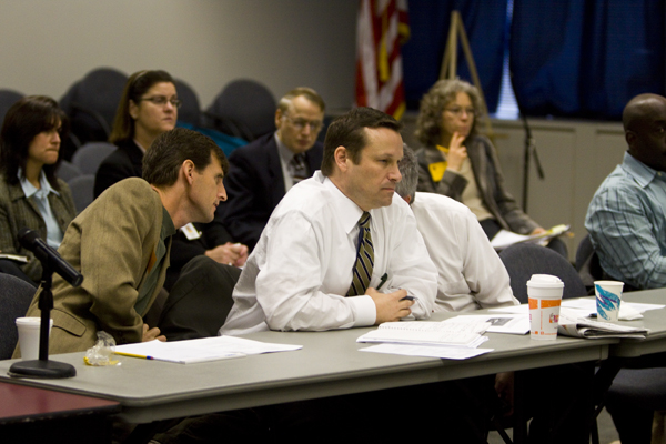 Dave Pringle (l) NJEF sits with and confers with fellow lobbyists from the Chamber of Commerce and Business & Industry Association