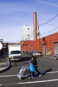 mother and child in industrial landscape of Paterson, NJ