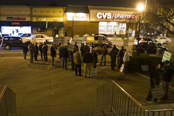 Union workers demonstrate outside Linden City Hall in support of new coal plant