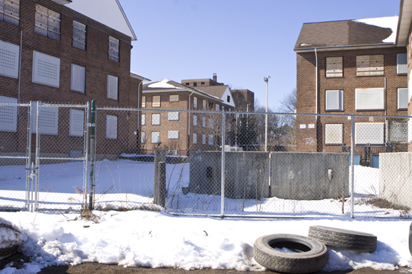 abandoned public housing, directly across street from Power Battery pollution.