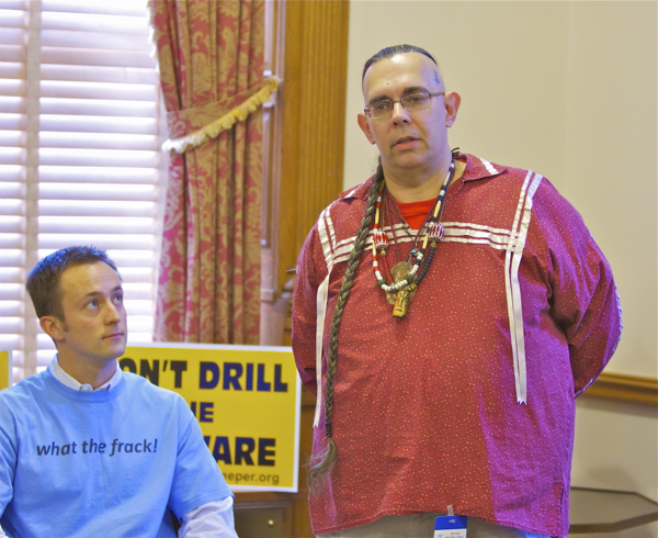 Lenape Chief Chuck "Gentle Moon" DeMund (standing) and 350.org regional representative demand that Gov. Christie and President Obama "Don't Drill the Delaware" at Trenton State House news conference today