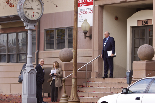 Benton (L) chats with the Godfatehr of NJ Toxics, Hal Bozarth, head of the NJ Chemistry Council. The clock location is apt - times up to the corporate special interests!