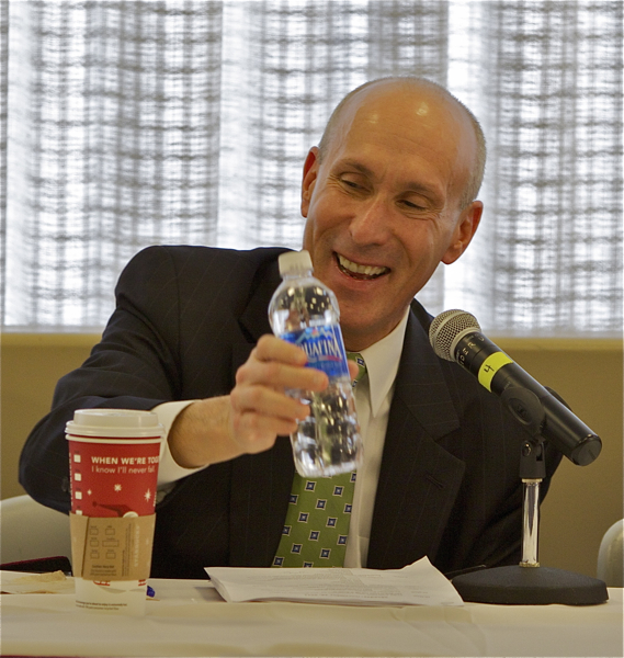 Outgoing Christie BPU President Lee Solomon gets a laugh about bottled water at a water utility conference