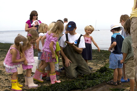 NOAA scientist with kids at Sandy Hook