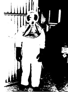 Troy Chemical worker wears respirator and protective gear to reduce mercury exposure - photo from NIOSH study of Troy plant