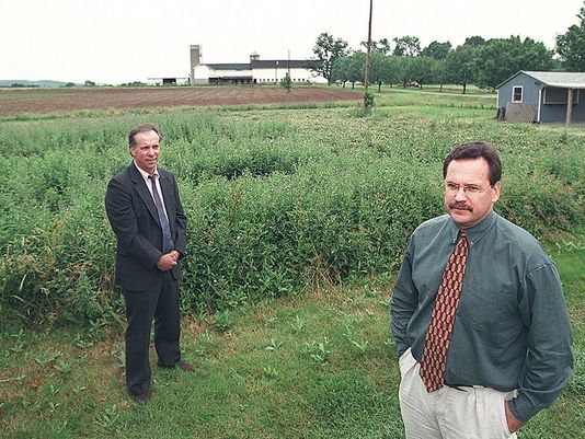 Bill Wolfe (left), then-policy director of the Sierra Club’s New Jersey chapter, and Jeff Tittel, the director of the environmental advocacy group, discuss farmland in Hopewell, Mercer County, that they hoped to preserve in 2000. (Photo: Courier-News file)