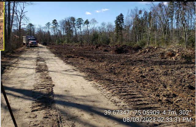Logging trucks on site. Source: NJ DEP
